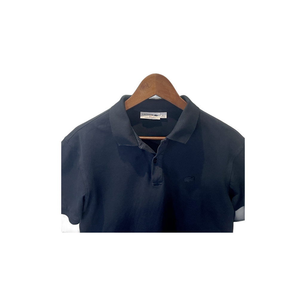 Polo Lacoste bleu marine - détail