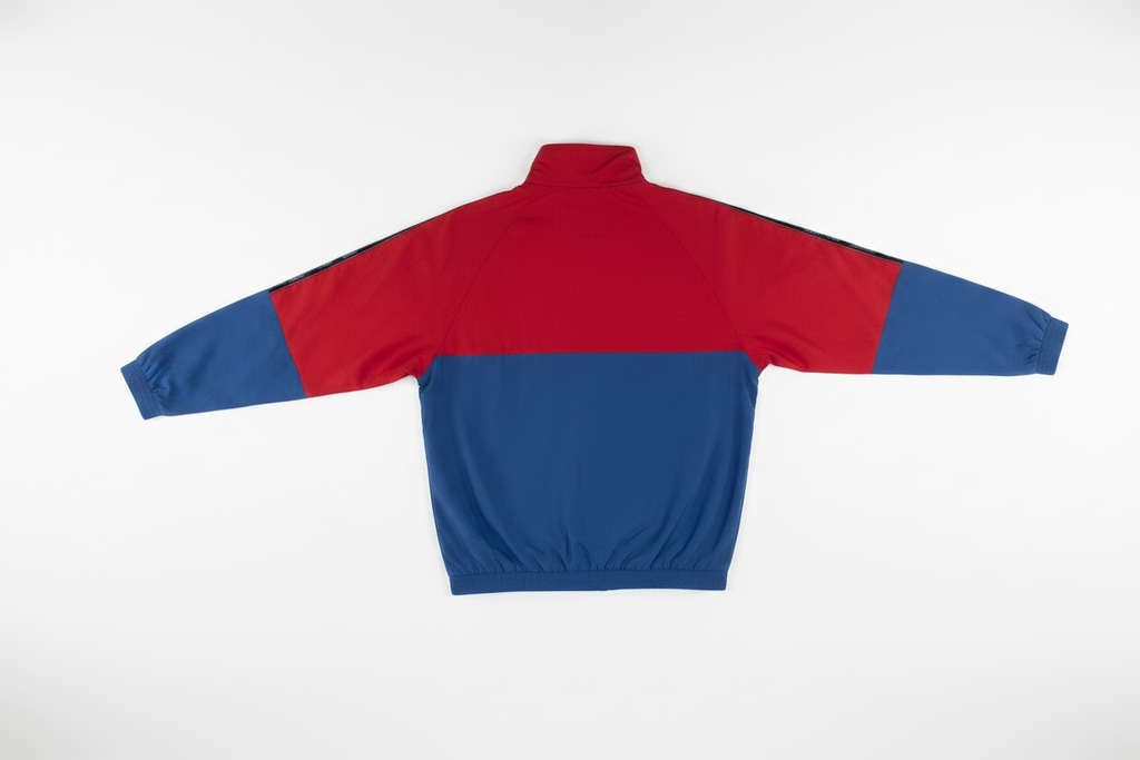 Veste Karl Kani unisexe M dos — coupe-vent oversize color-block rouge bleu col jaune logo brodé — seconde main vintage 90s — Epok Label